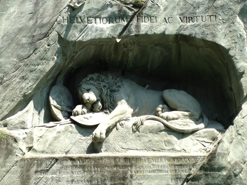 solid, art and craft, low angle view, lion, monument, sculpture, text, creativity, history, lucerne, artwork, statue, belief, the past, switzerland, human representation