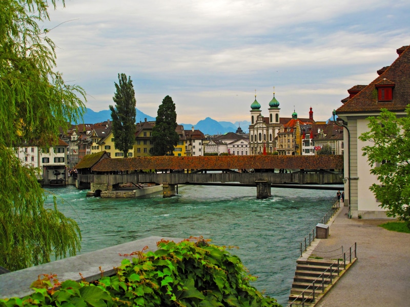 building exterior, Luzern, water, architecture, tree, sky, bridge, body, 2K, home, promenade, city, cloud - sky, no people, religion, river, building