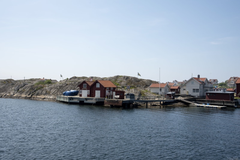 sea life, fishing industry, blue, waterfront, nature, nautical vessel, cliffs, residential district, building exterior, sweden, transportation, coastal