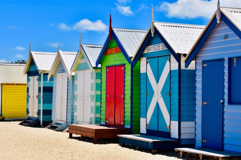 door, blue, outdoors, building exterior, furniture, side by side, in a row, no people, melbourne, building, sunny, beach, wood - material, day, 5K, bench