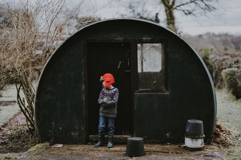 stood, childhood, child, built structure, casual clothing, man, clothing, outdoors, males, building exterior, shed, nature, one person, boy, lifestyles