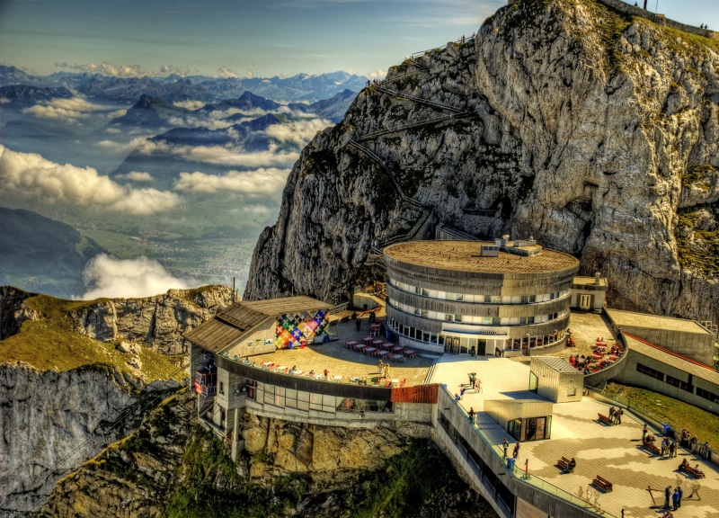 sky, built structure, building exterior, mountains, day, travel destinations, ancient civilization, beauty in nature, the past, mountain range, mountain