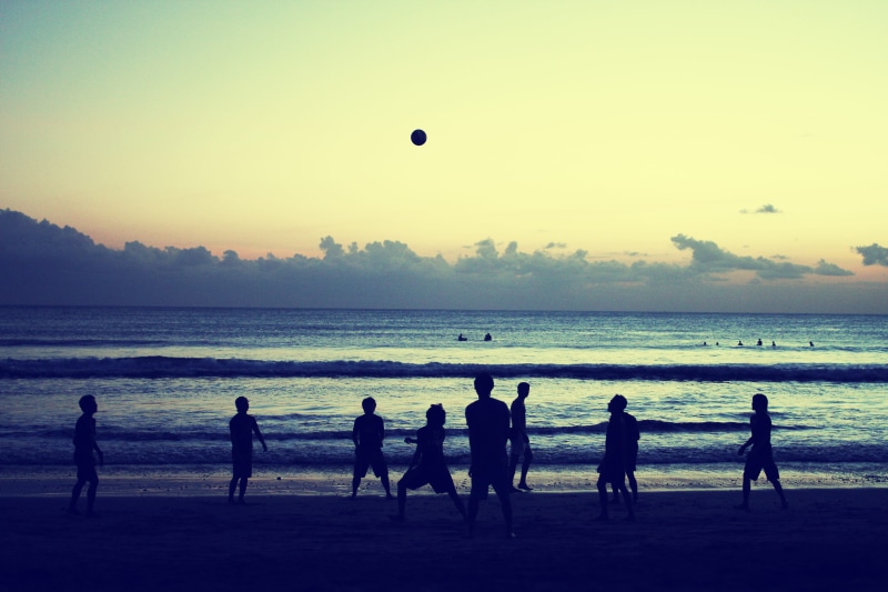 leisure activity, horizon over water, water, scenics - nature, locals, nature, beach, balinese, sky, sport, outdoors, medium group of people, horizon, football