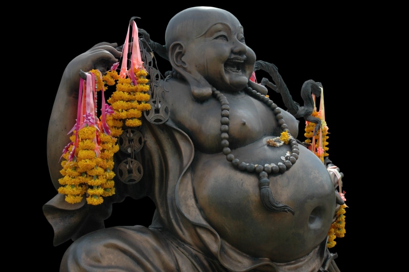 figure, studio shot, art, close-up, spirituality, representation, flower, shamanism, obese, art and craft, prosperity, statue, festival, black background
