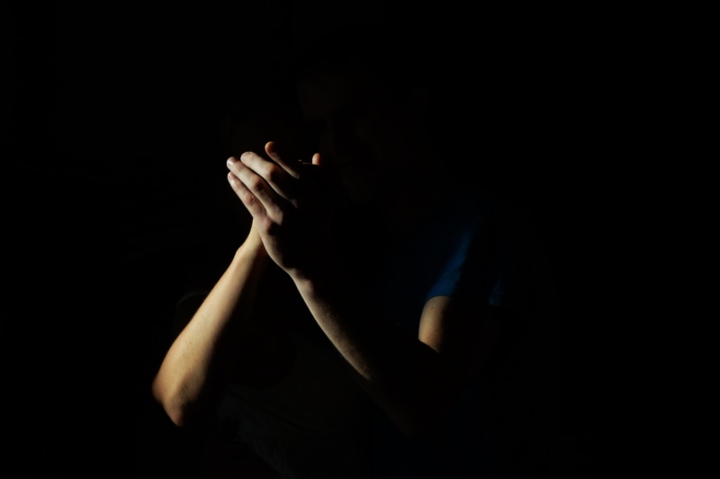 adult, communication, one Person, portrait, spirituality, christianity, black, holding, photo, light, indoors, young adult, person, black Background, praying