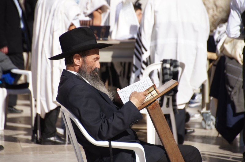 business, prayer, chair, reading, newspaper, torah, men, males, jewish, belief, bible, faith, book, pray, symbol, hat, cap, jerusalem, sacred, mature adult