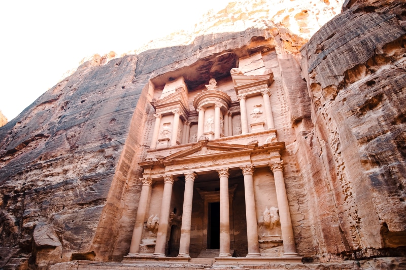 archaeology, fort, low angle view, history, art and craft, landmark, rock formation, architecture, pillar, petra, building exterior, jordan, day, ancient