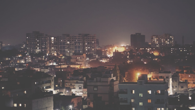 high angle view, building exterior, cityscape, architecture, apartment, sky, outdoors, office building exterior, india, illuminated, building, pune, night