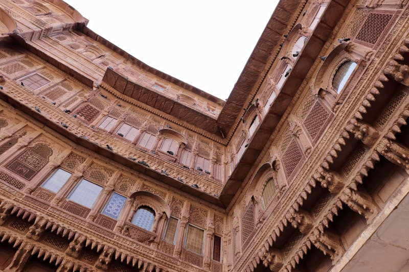 architectural column, palace, building, tourism, windows, building exterior, low angle view, day, india, ancient civilization, carving - craft product