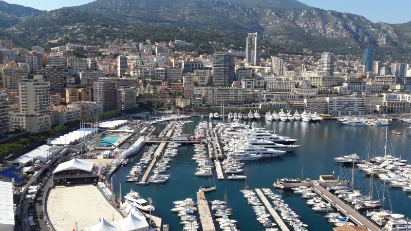 mountain, water, day, built structure, office building exterior, port, marina, building exterior, skyscraper, travel destinations, building, sea, harbor