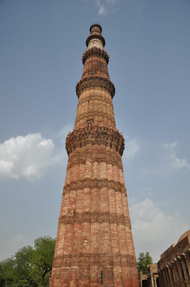 tourism, travel destinations, carved, tower, outdoors, Minaret, delhi, ancient civilization, sky, qutab, tree, city, architectural column, qutub, travel