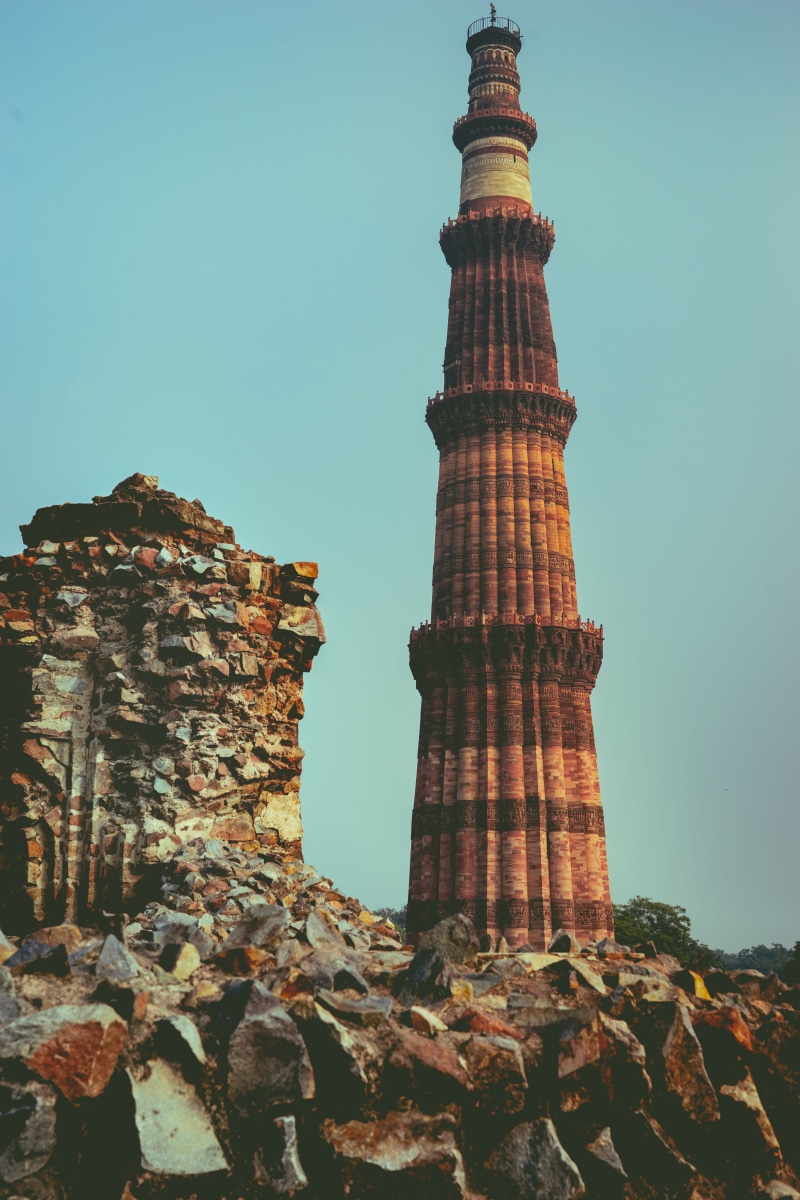pillar, archaeology, clear sky, ruins, travel destinations, building, india, no people, monument, obelisk, ruined, architectural column, the past, built structure