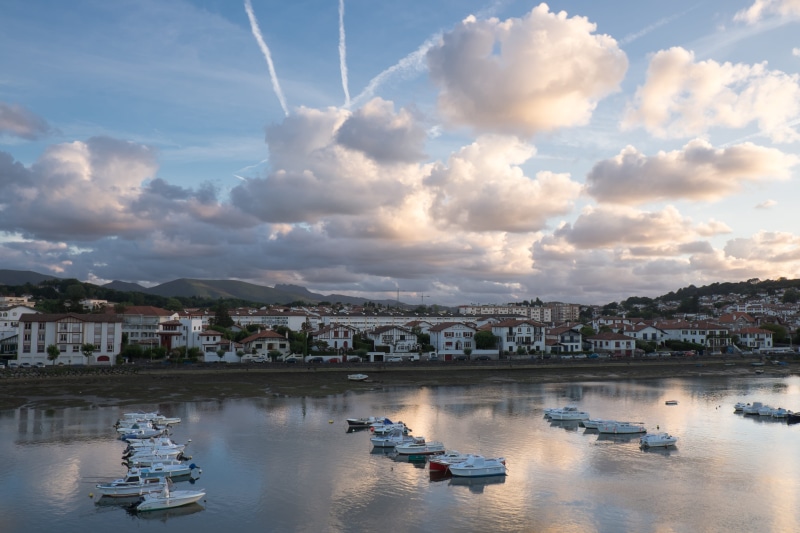 weather, no people, building exterior, residential district, pier, cloud, nautical vessel, boats, dock, vehicle, cumulus, transportation, passenger craft