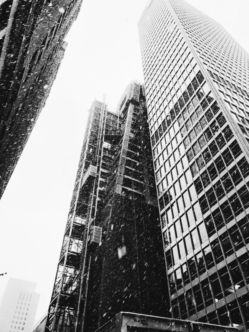 low angle view, nyc, clear sky, modern, residential district, sky, the museum of modern art, grit, glass - material, office, skyscraper, building exterior
