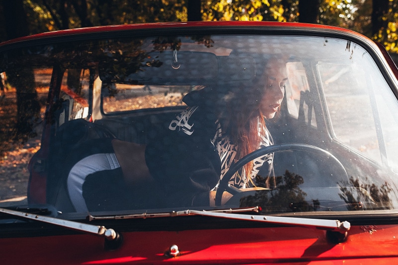 vintage car, sportswear, nature, women, car, portrait, sunlight, redhead, women outdoors, inside a car, reflection, transparent, day, real people, travel