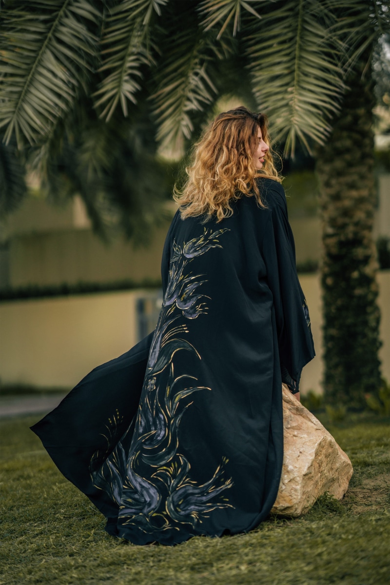 green color, full length, kaftan, one person, miracle, girl, young adult, plant, united arab emirates, leisure activity, greens, park, clothing, abaya