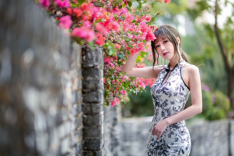 Asian, Chinese dress, women, wall, long hair, trees, looking at viewer, model, ponytail, brunette, depth of field, flowers, earring, 4K