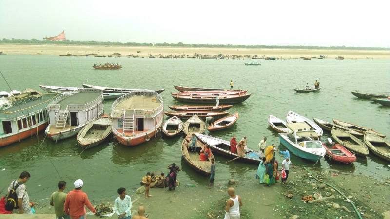 nautical vessel, moored, real people, travel, india, outdoors, men, leisure activity, fishing boat, sky, group of people, nature, women, mode of transportation
