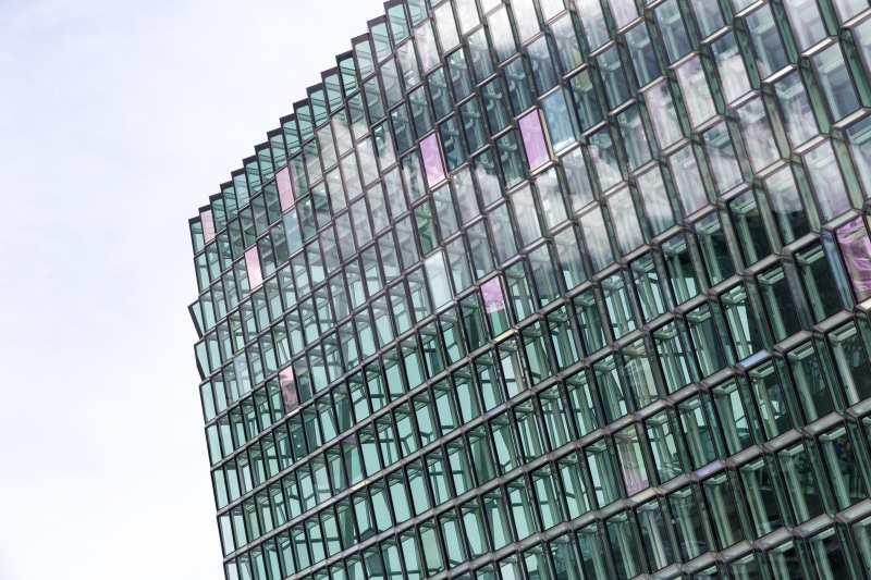 sky, building exterior, office building exterior, architecture, glass, harpa, construction industry, day, low angle view, no people, modern, pattern, skyscraper