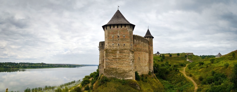 clouds, ancient, built Structure, cloud - sky, building, outdoors, beauty in nature, fort, medieval, surrounding Wall, brown, shrubs, Ukraine, tree, concrete
