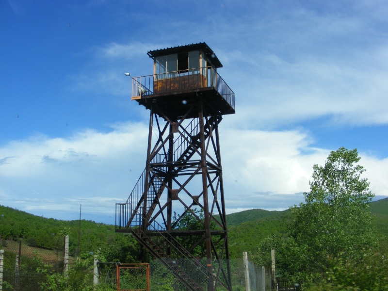 land, non-urban scene, built structure, day, tree, tower, cloud - sky, building exterior, the old, outdoors, protection, safety, observation point, 2K