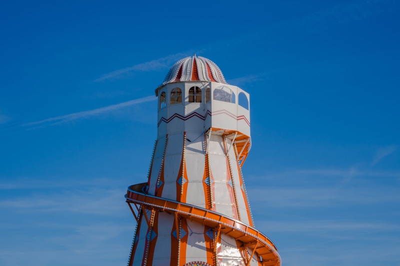 water tower - storage tank, dome, building exterior, orange, tower, circu, architecture, white, no people, metal, blue, sunlight, fairground, travel, structure