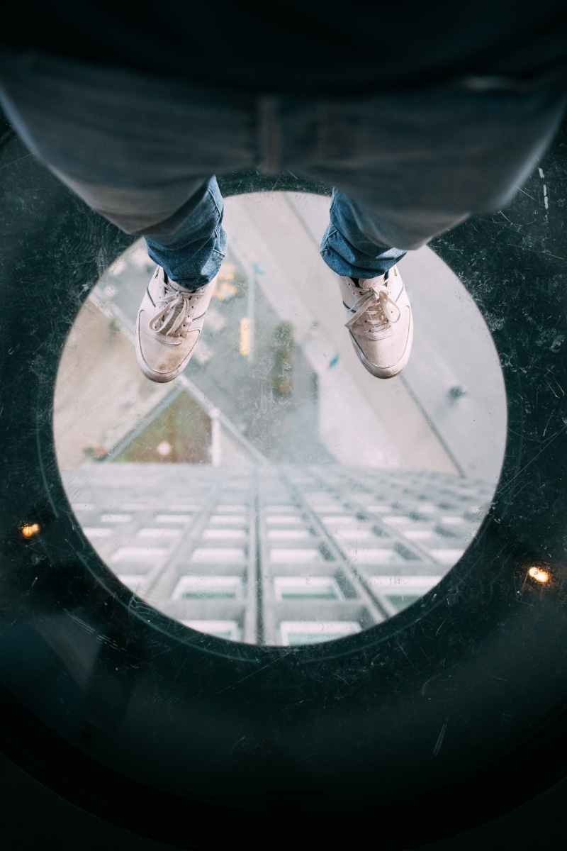 low section, human leg, amsterdam, jeans, lifestyles, day, unrecognizable person, person, men, nature, looking o, city, circle, adam, surface, standing