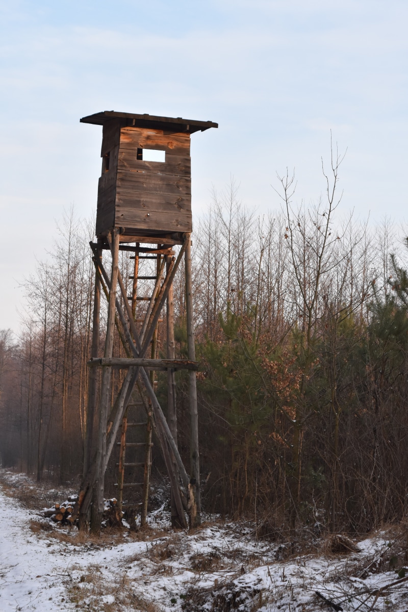 no people, winter, water conservation, outdoors, non-urban scene, snow, land, lookout tower, sky, forest, tranquility, scenics - nature, tower, architecture
