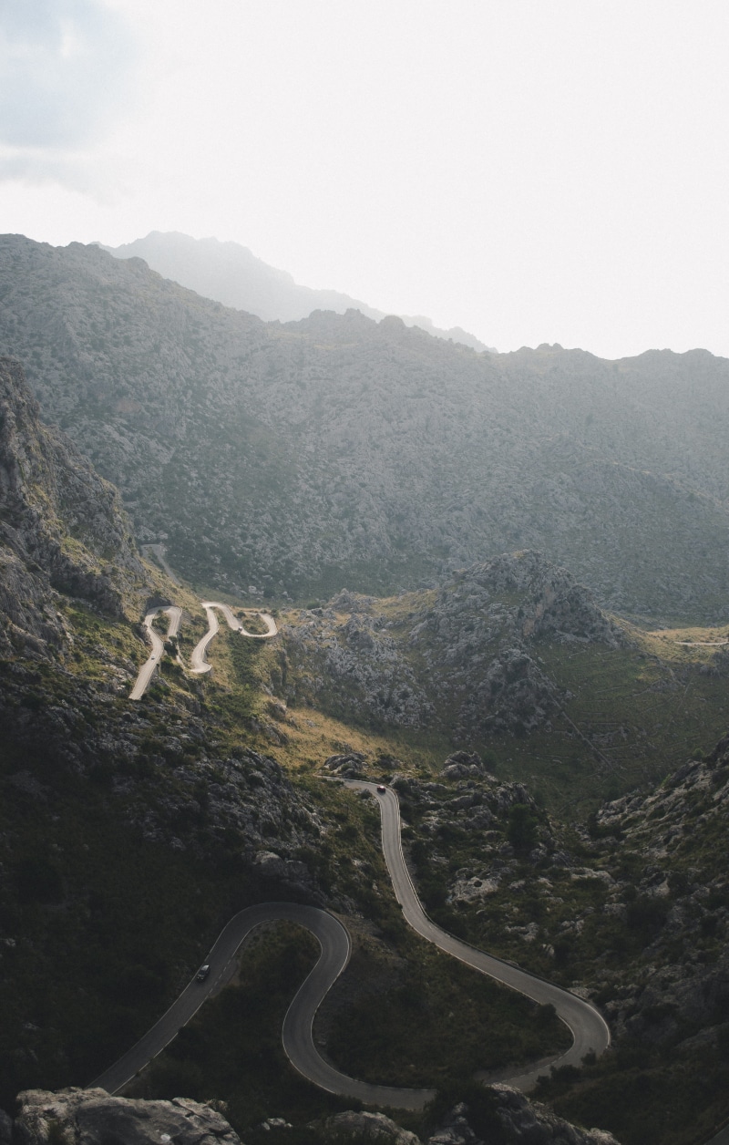 pass, aerial, mountain Range, famous Place, majorca, fog, nature, cliffside, sky, car, forest, scenics, travel Destinations, vehicle, road, view, tourism