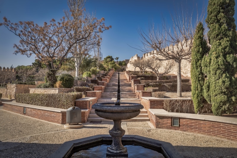 clear sky, bare tree, architecture, tree, no people, travel destinations, historic, sky, andalusia, fortress, building exterior, palace, landmark, growth
