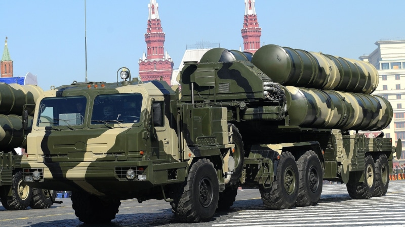 sunlight, no people, trucks, architecture, military, mode of transportation, building exterior, Russian Army, travel, road, missiles, freight transportation