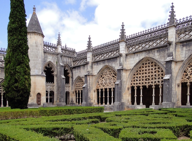 the past, mary winning, building exterior, St, batalha, history, cypress, nature, low angle view, manueline style, architectural column, arch, Monastery