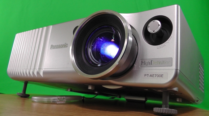 table, collection movies, home theater, connection, arts culture and entertainment, technology, home movies, light, electrical equipment, filming, objective