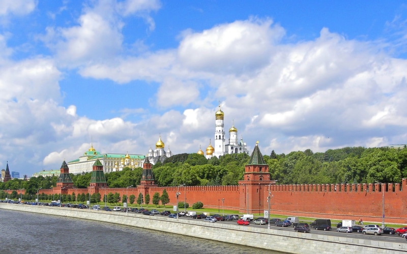 building Exterior, travel destinations, cloud - sky, urban Scene, panorama, sky, cathedral, tower, cultures, church, building, car, summer, travel, famous Place