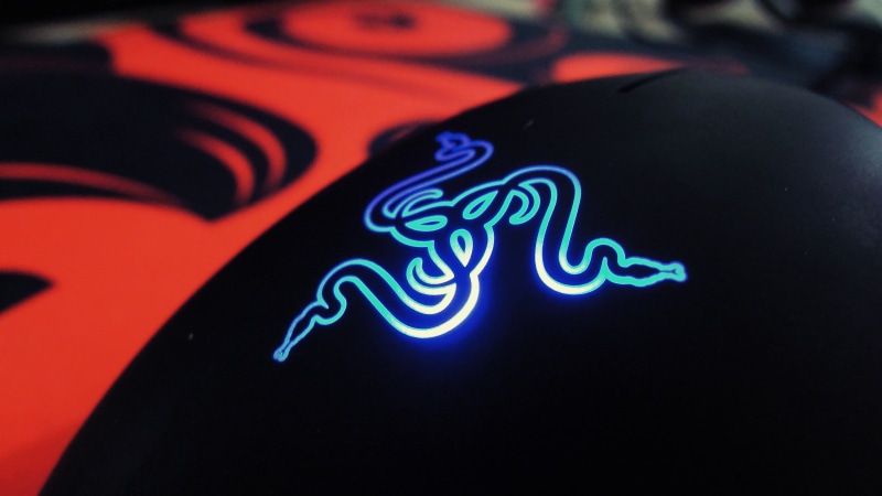 human representation, close-up, vibrant color, neon, indoors, razer video games computer mice, blue, sign, glowing, light, arts culture and entertainment