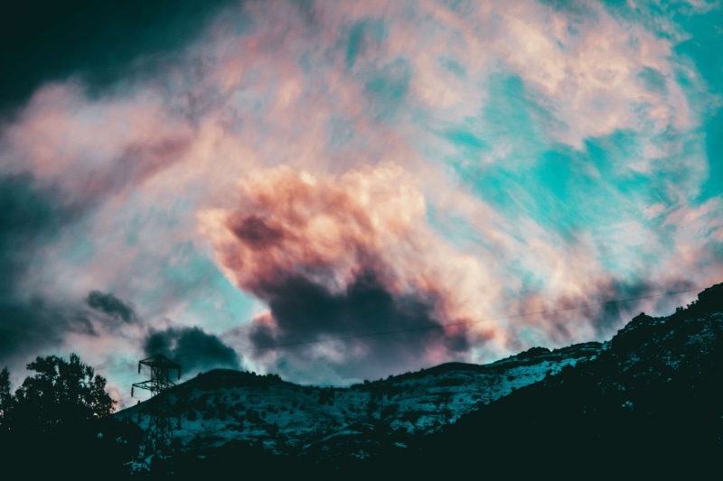 scenics - nature, mountain range, warm, beauty in nature, light, nature, landscape, horizon, blue sky clouds, power in nature, low angle view, sky clouds