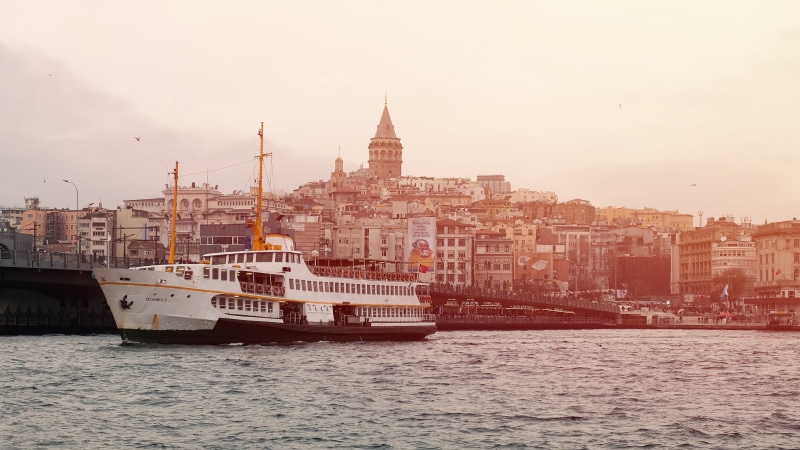 sunset, mode of transportation, body, windows, yacht, travel, water, sky, bosphorus, city, boat, condominium, urban, turkey - Middle East, urban skyline