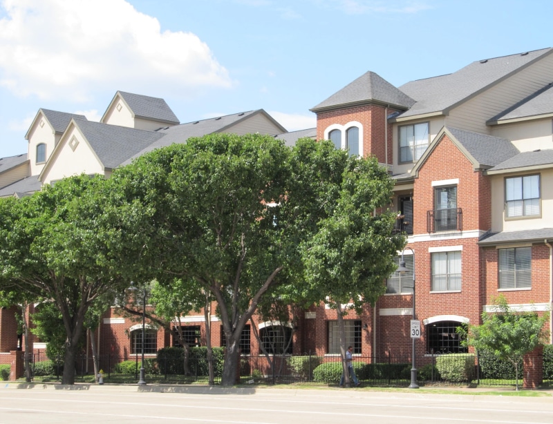 outdoors, plants, urban condominiums, building, houses, homes, daytime, condo, building Exterior, condominium, city, growth, cloud - sky, sunlight, townhome