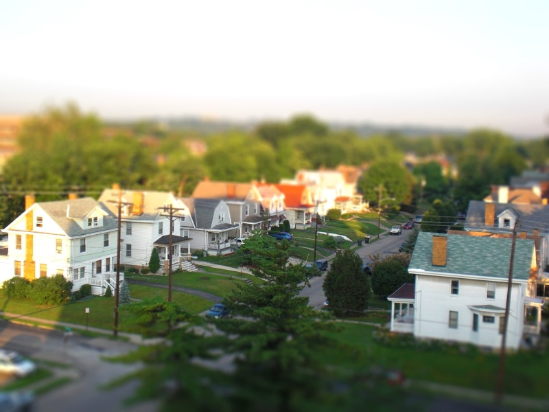 tilt-shift, photo, car, wooden houses, road, live, no people, building, row house, outdoors, tiltshift, residential area, apartment, sky, nature, architecture