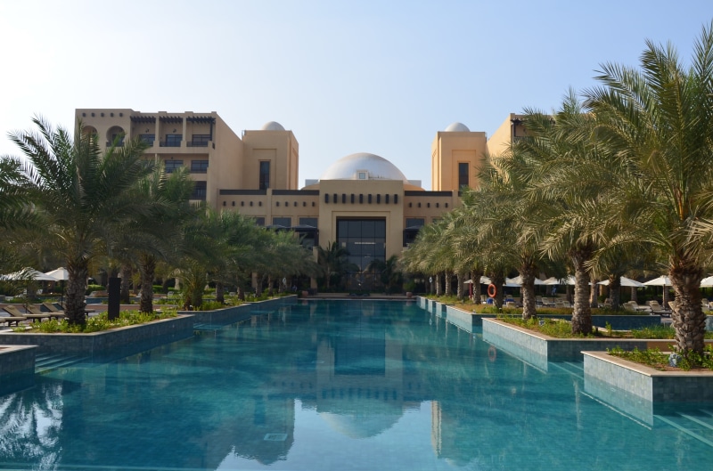 day, Hotel, luxury, tree, U A, water, plant, no people, A E, hilton ras al khaimah, pool, architecture, waterfront, building exterior, 4K, clear sky, reflection