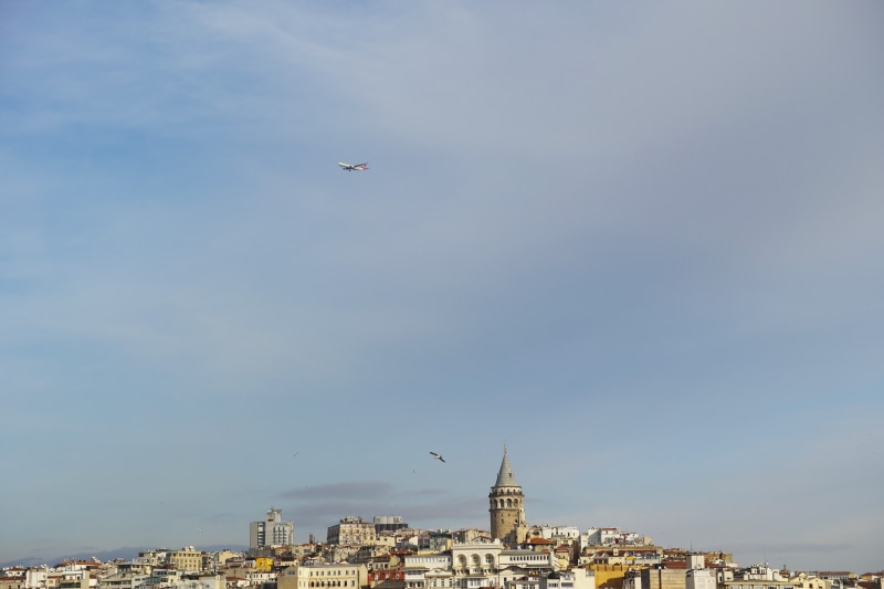 beautiful, airplane, flying, background, cityscape, building, cloud, transportation, outdoors, building exterior, islam, historical works, mid-air, townscape