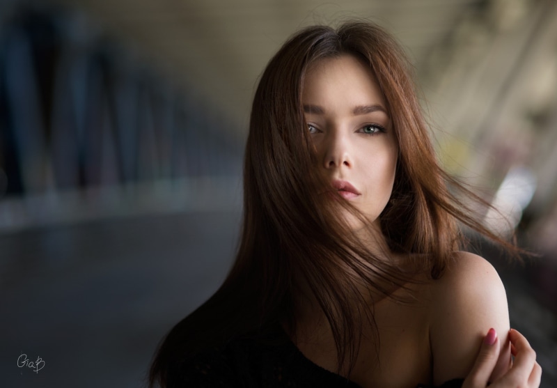 headshot, looking at camera, beauty, teenager, beautiful woman, focus on foreground, hair in face, long hair, looking, brown eyes, face, 1080P, contemplation