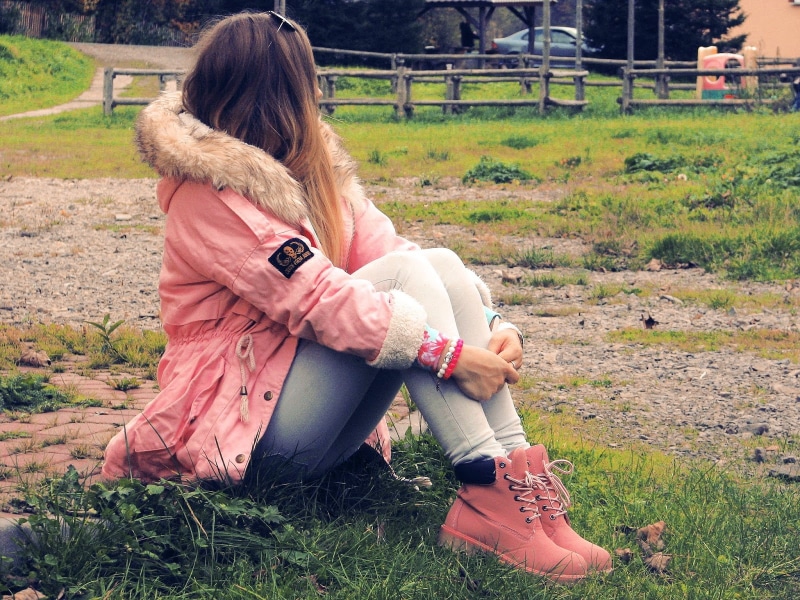 pink coat, nature, women, child, outdoors, day, sitting, one person, plant, legs together, women with shades, land, full length, field, lifestyles, real people