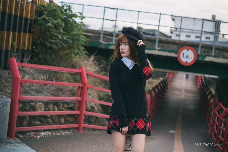 hairstyle, street, clothing, focus on foreground, real people, fashion, railing, young adult, model, Asian, lifestyles, casual clothing, one person, front view