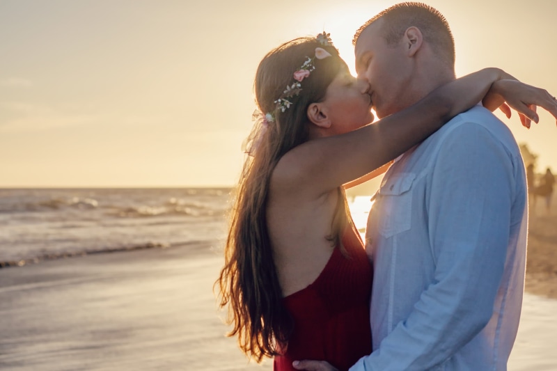 affection, dusk, backlit, water, togetherness, seashore, women, summer, hair, young couple, couple, adult, man, sand, ocean, positive emotion, romance