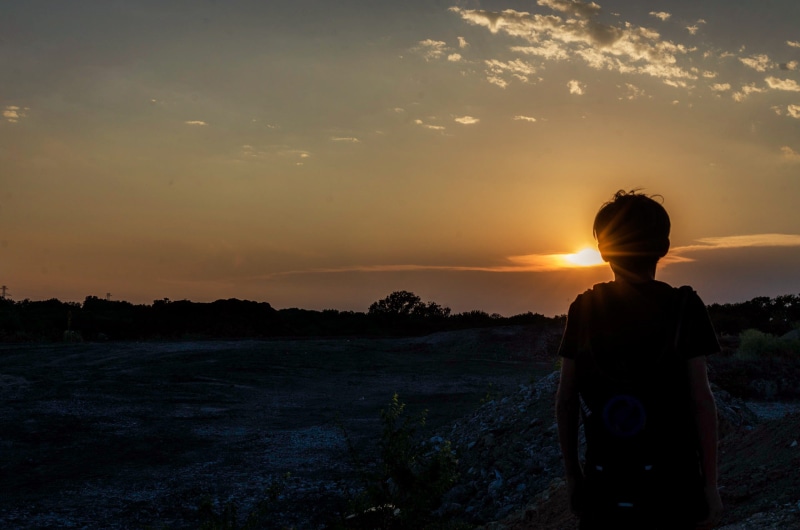 one person, outdoors, shadow, sun glare, justifyyourlove, trees, sky, nature, scenery, idyllic, childhood, real people, boy, person, leisure activity, dawn