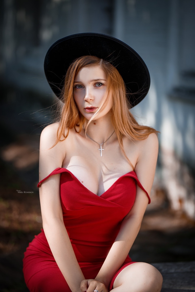 red dress, cleavage, women outdoors, hair in face, looking at viewer, women with hats, dress, model, women, bare shoulders, 1080P, necklace, depth of field