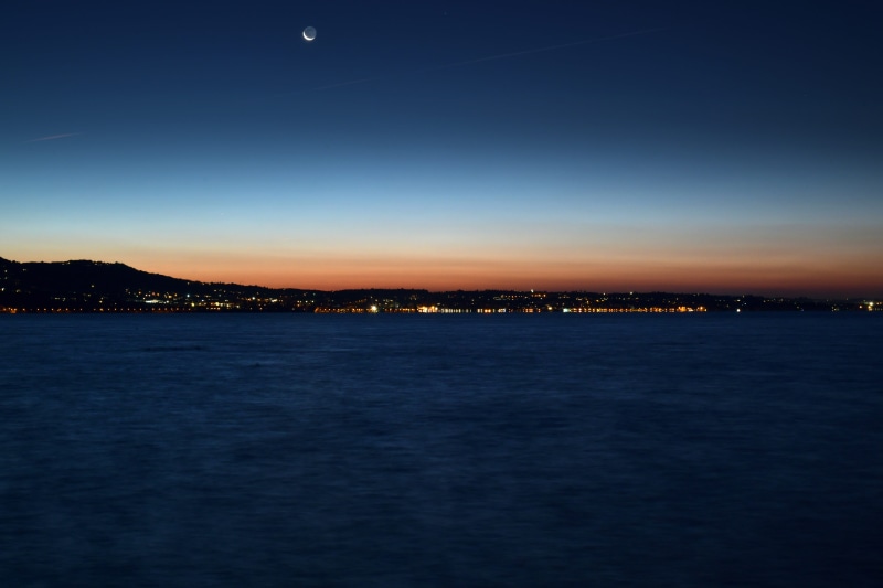 scenery, architecture, night, waterfront, idyllic, sea, sun, illuminated, ocean, city lights, 8K, city, lights, dawn, scenic, peaceful, water