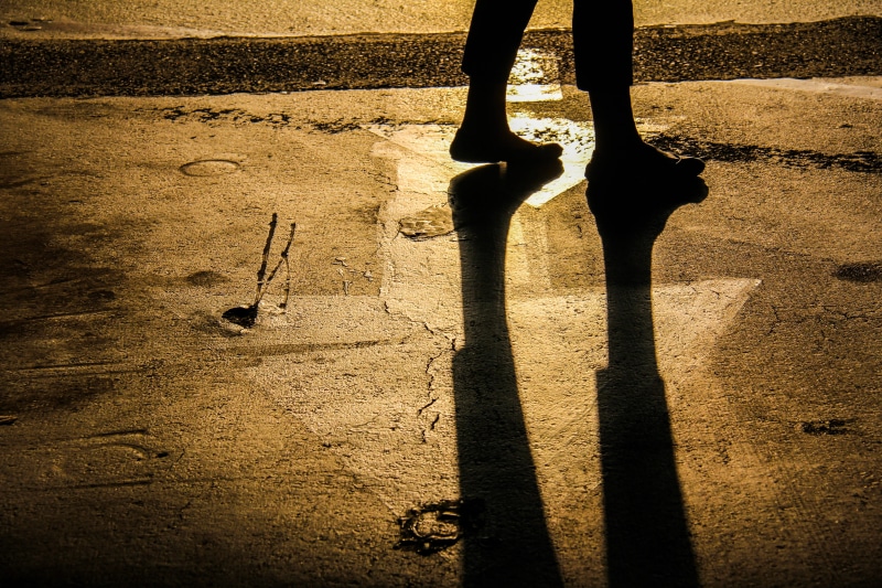 adventure, human leg, nature, bittersweet, personal, arrow, day, sepia, shadows, one person, walking, journey, human body part, shadow, modern pilgrim