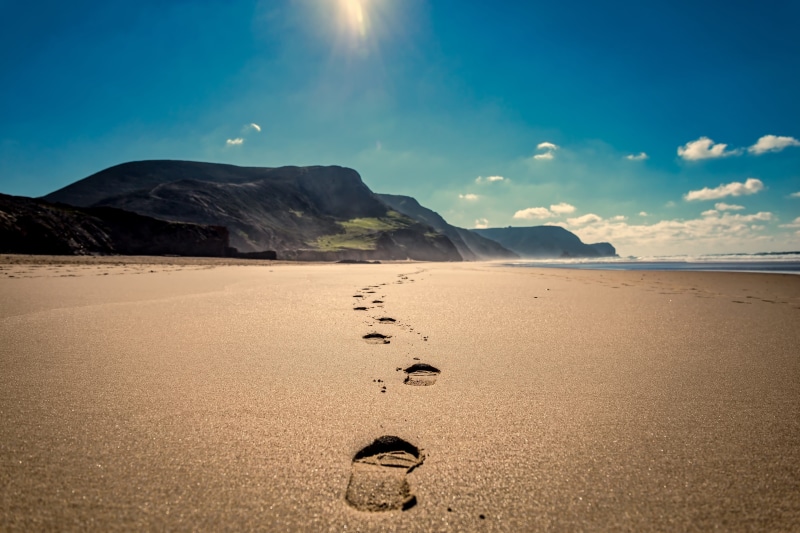 cloud - sky, beach, arid climate, journey, sky, mountain, coast, footprint, outdoor, sea, outdoors, non-urban scene, beauty in nature, tranquility, ocean
